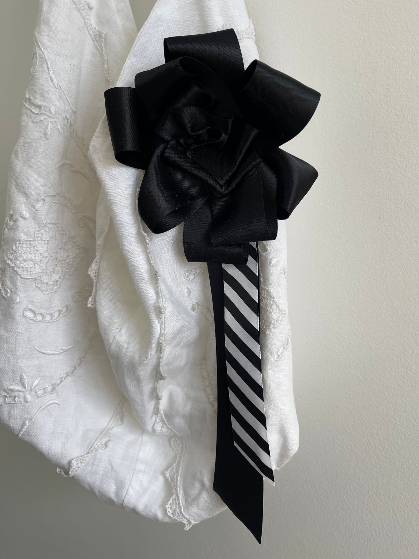 BLACK STRIPE ROSETTE BADGE